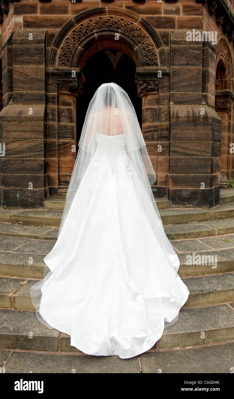 Bride Facing Away From Camera To Show Off The Back Of Her Wedding Stock 